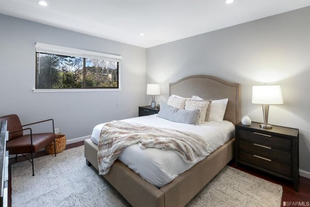 a en suite bathroom with a sink and a mirror