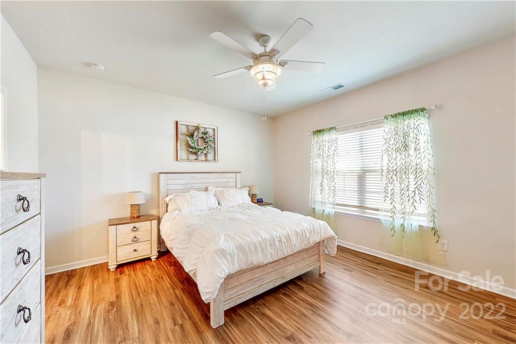 1016 Loggerhead Drive Lancaster, SC 29720 - Photo 13 of 46 a bedroom with a large bed and a window