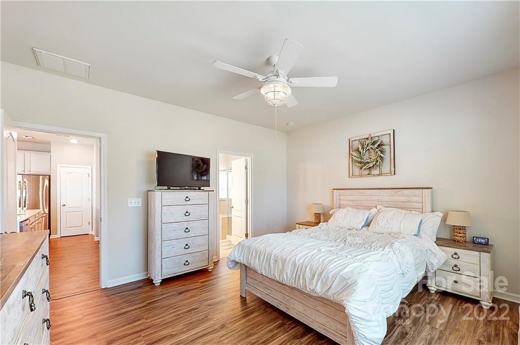1016 Loggerhead Drive Lancaster, SC 29720 - Photo 14 of 46 a bedroom with a bed and a flat screen tv