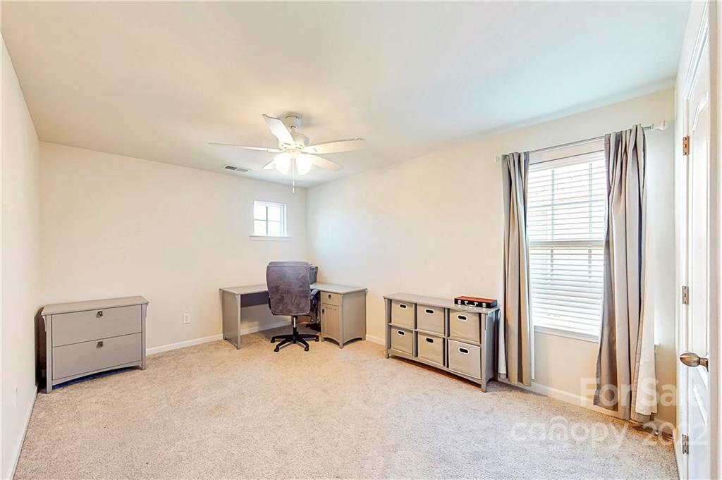 1016 Loggerhead Drive Lancaster, SC 29720 - Photo 29 of 46 a view of a bedroom with furniture and a window