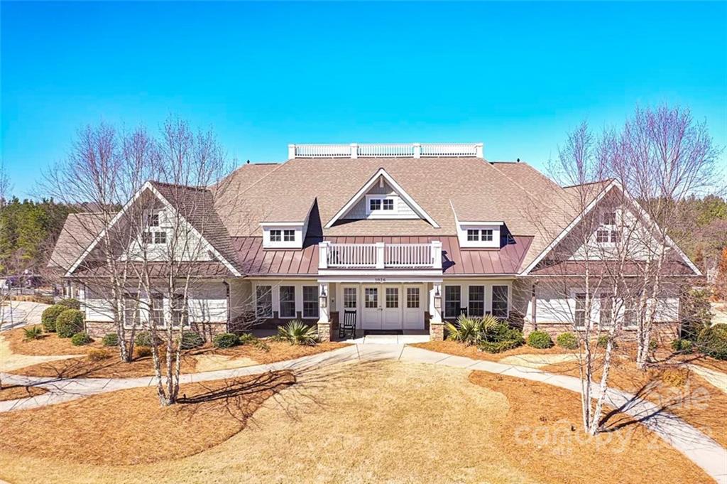 1016 Loggerhead Drive Lancaster, SC 29720 - Photo 41 of 46 a front view of a residential apartment building with a yard