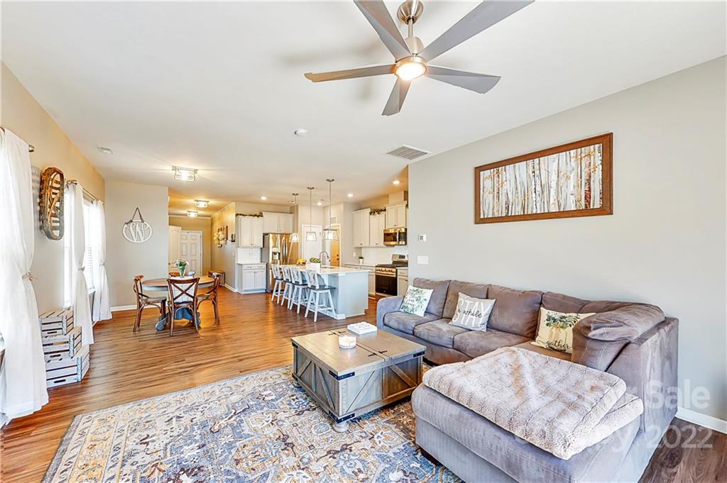 1016 Loggerhead Drive Lancaster, SC 29720 - Photo 9 of 46 a living room with furniture and a chandelier
