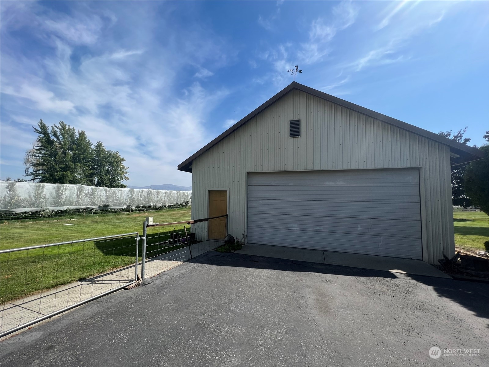 14 Weatherstone Road Omak, WA 98841 - Photo 28 of 32 a house with a yard