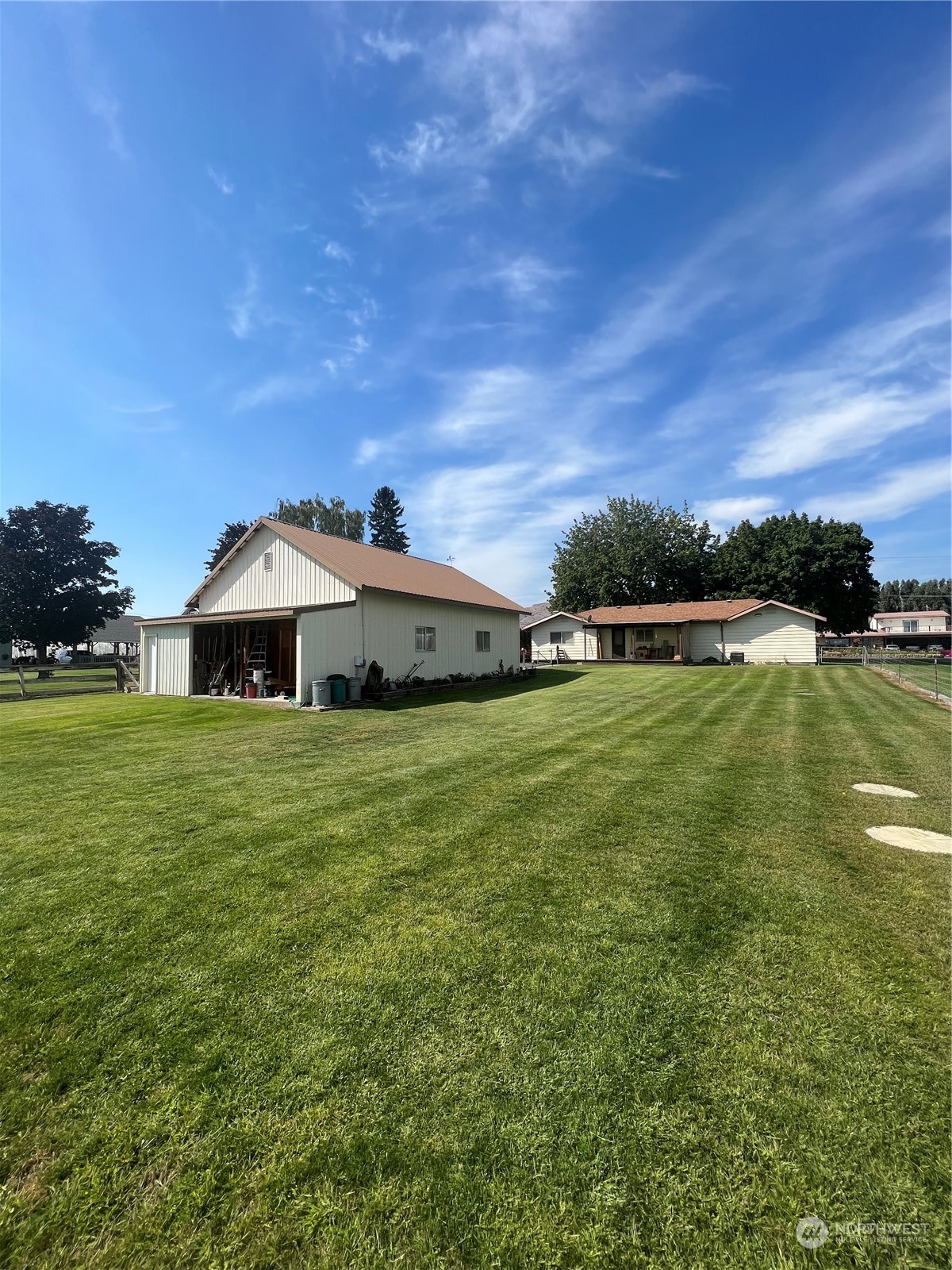 14 Weatherstone Road Omak, WA 98841 - Photo 30 of 32 a front view of a house with a yard