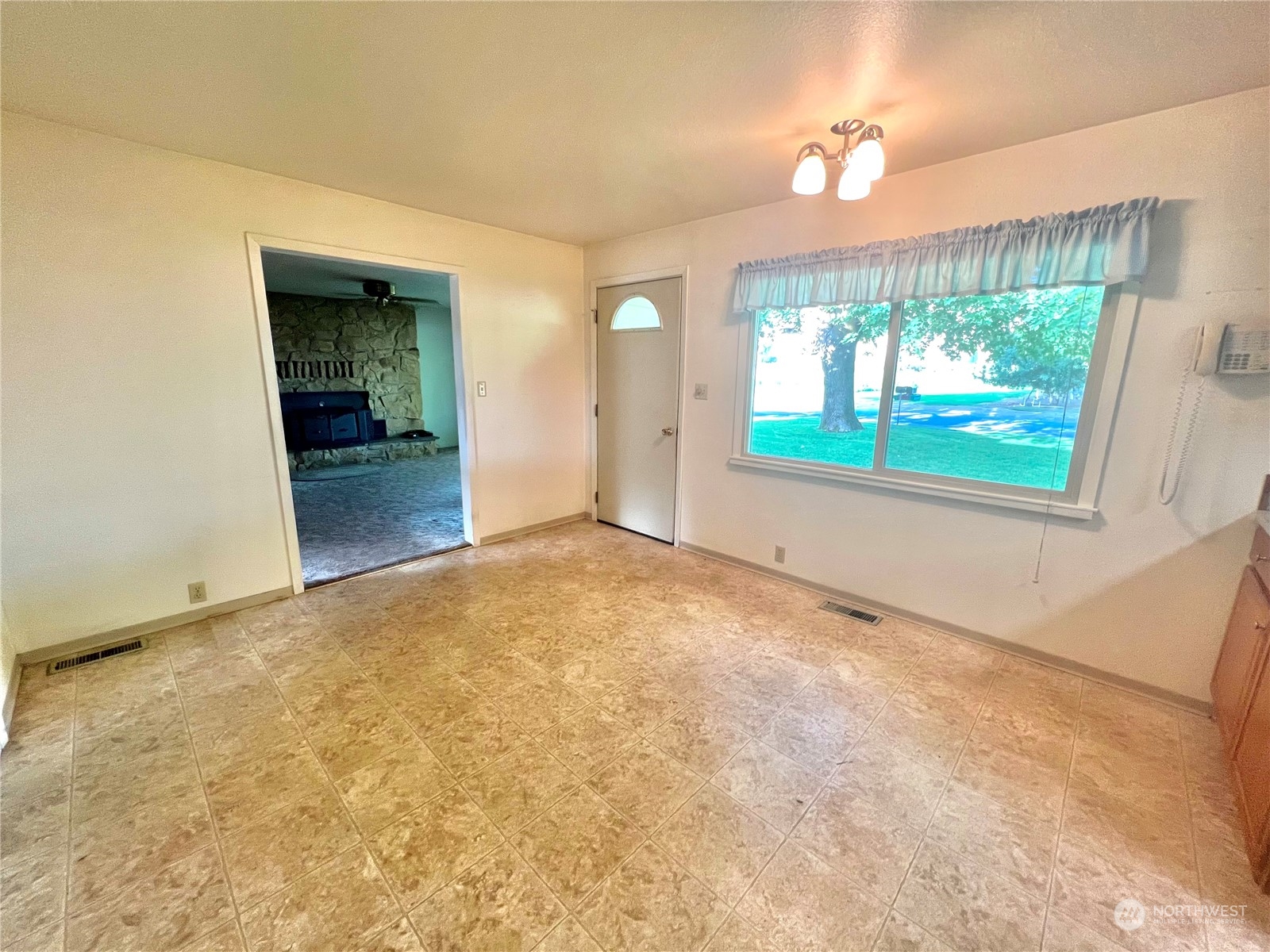 14 Weatherstone Road Omak, WA 98841 - Photo 8 of 32 a view of an empty room with a window