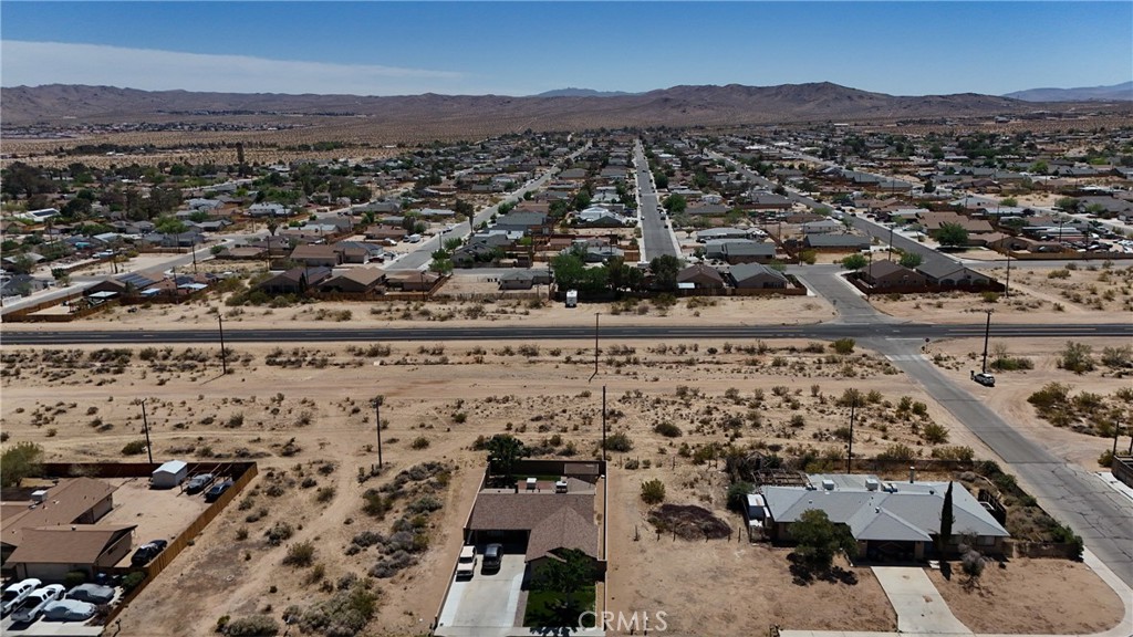744 West Bowman (near) Road Ridgecrest, CA 93555 - Photo 3 of 9 Red boundary lines on pictures are an estimate and for marketing purposes only. Buyer to verify all aspects of this property including, but not limited to utilities, assessments, boundaries, usage, access, and zoning to satisfy themselves.