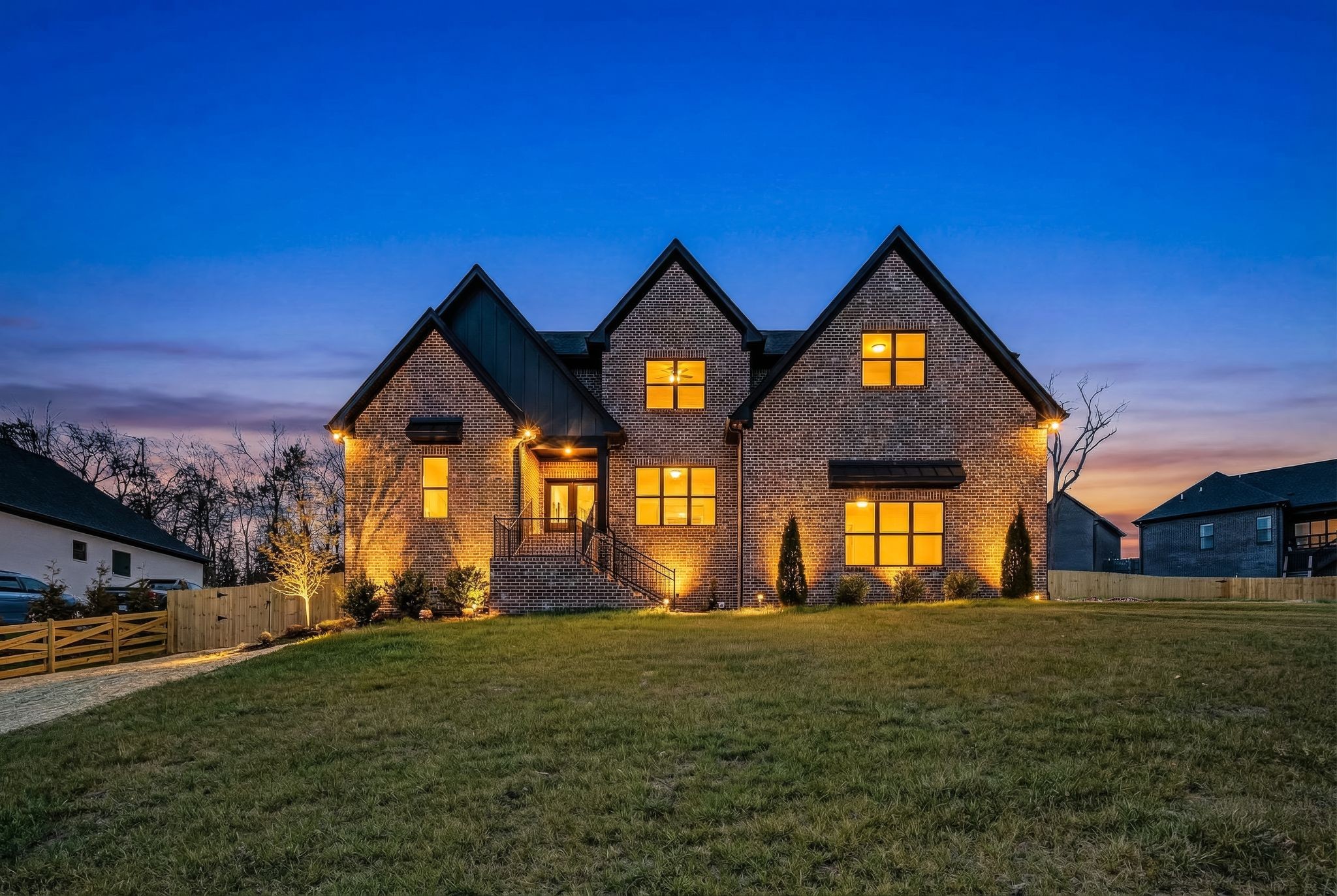 a front view of a house with a yard