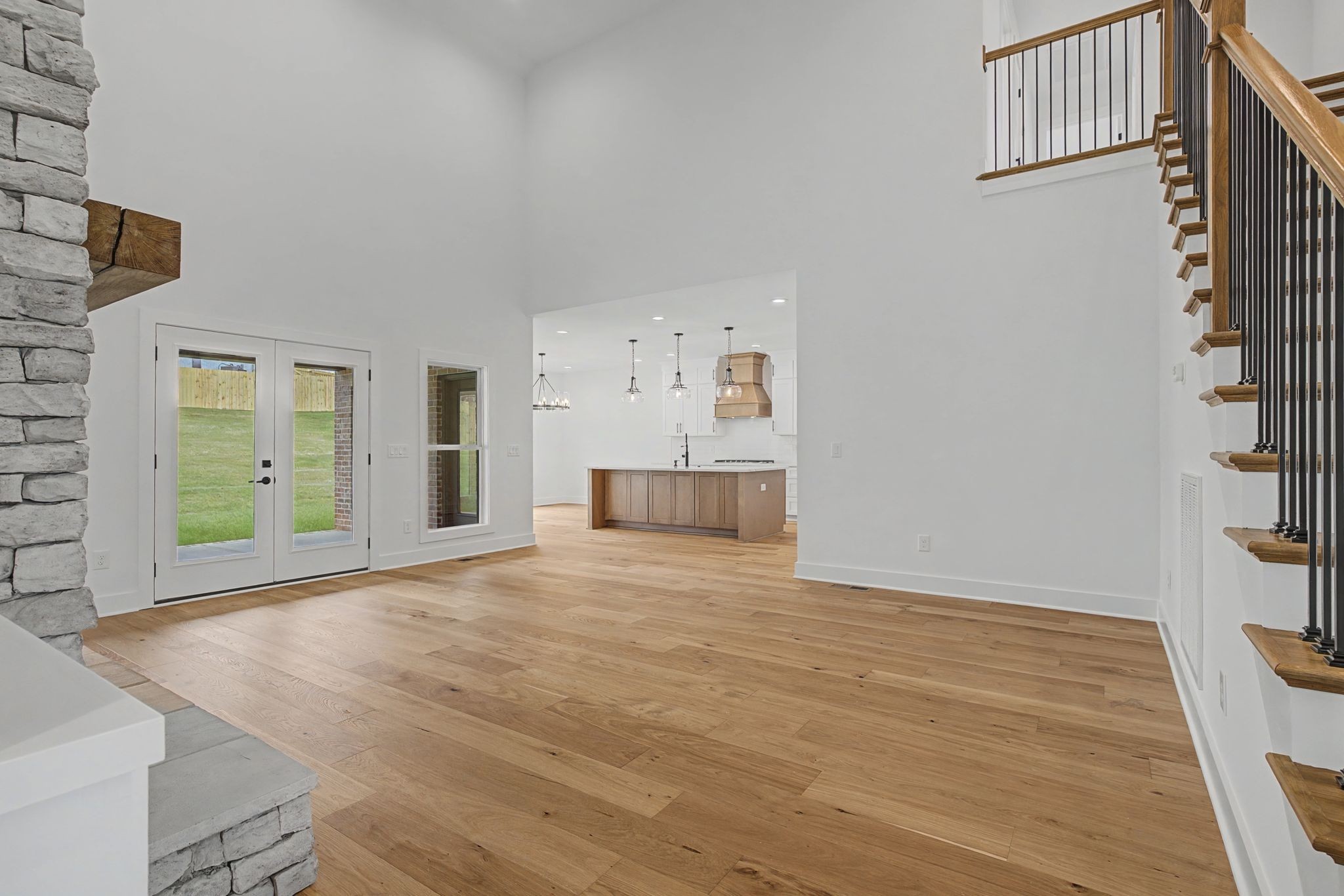1491 Nonaville Road Mount Juliet, TN 37122 - Photo 18 of 60 a view of empty room with a fireplace and wooden floor