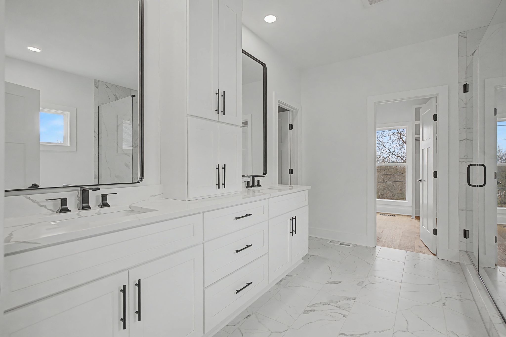1491 Nonaville Road Mount Juliet, TN 37122 - Photo 33 of 60 a bathroom with double sink and a mirror