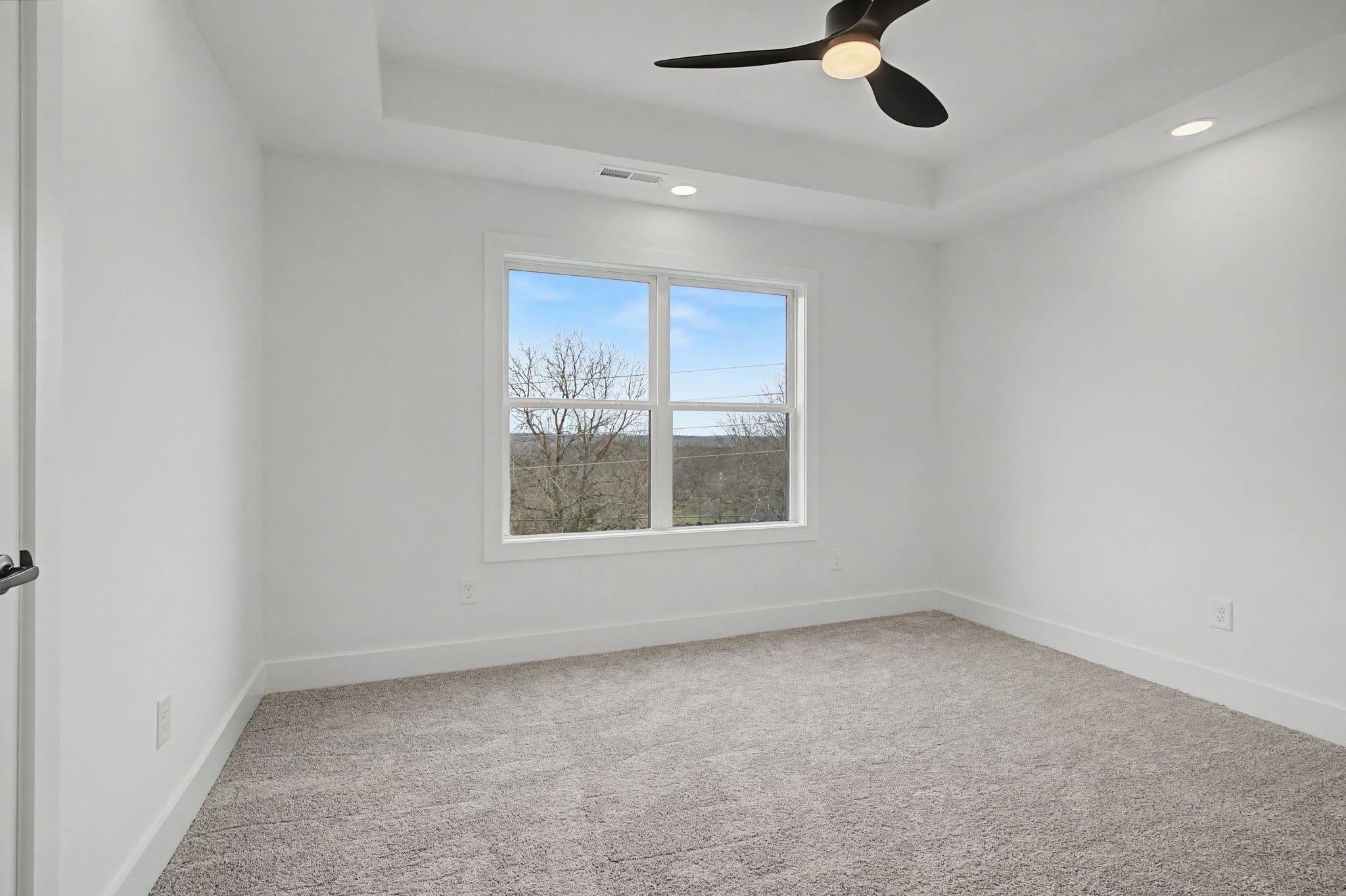 1491 Nonaville Road Mount Juliet, TN 37122 - Photo 40 of 60 an empty room with a window and a ceiling fan