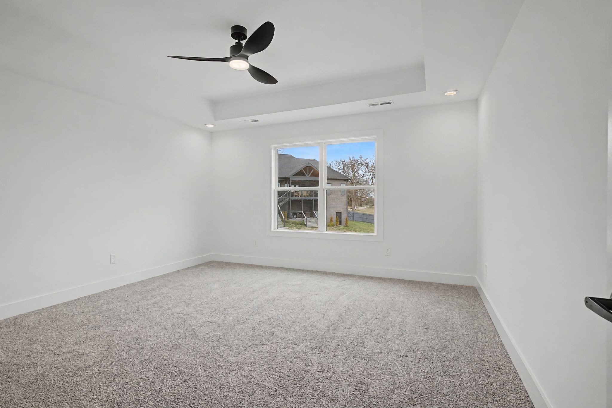 1491 Nonaville Road Mount Juliet, TN 37122 - Photo 46 of 60 an empty room with windows and ceiling fan