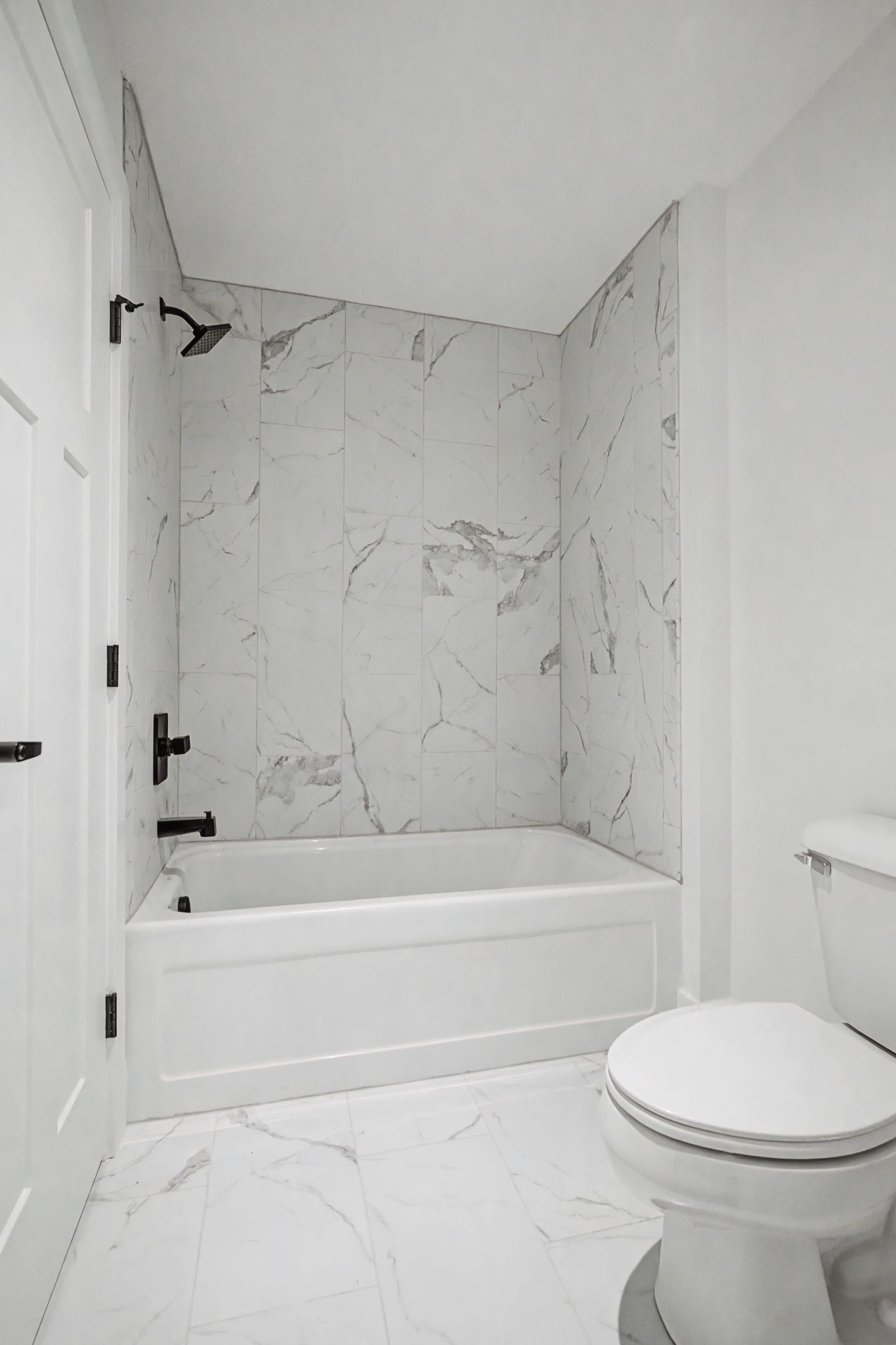 1491 Nonaville Road Mount Juliet, TN 37122 - Photo 50 of 60 a bathroom with a toilet and a bathtub