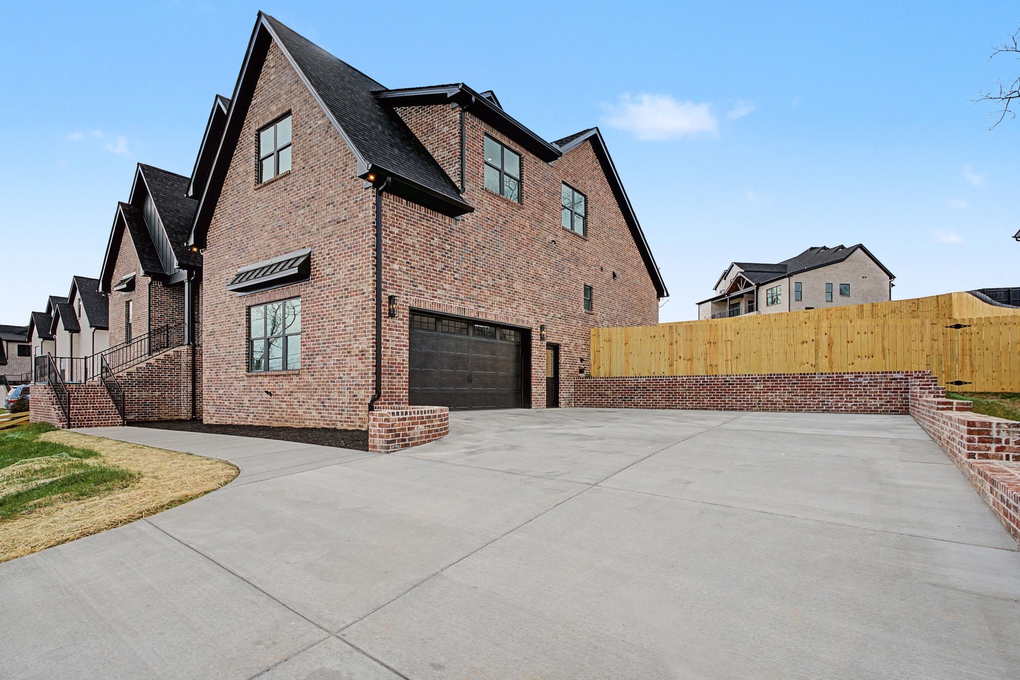 1491 Nonaville Road Mount Juliet, TN 37122 - Photo 9 of 60 a front view of a house with a yard and garage