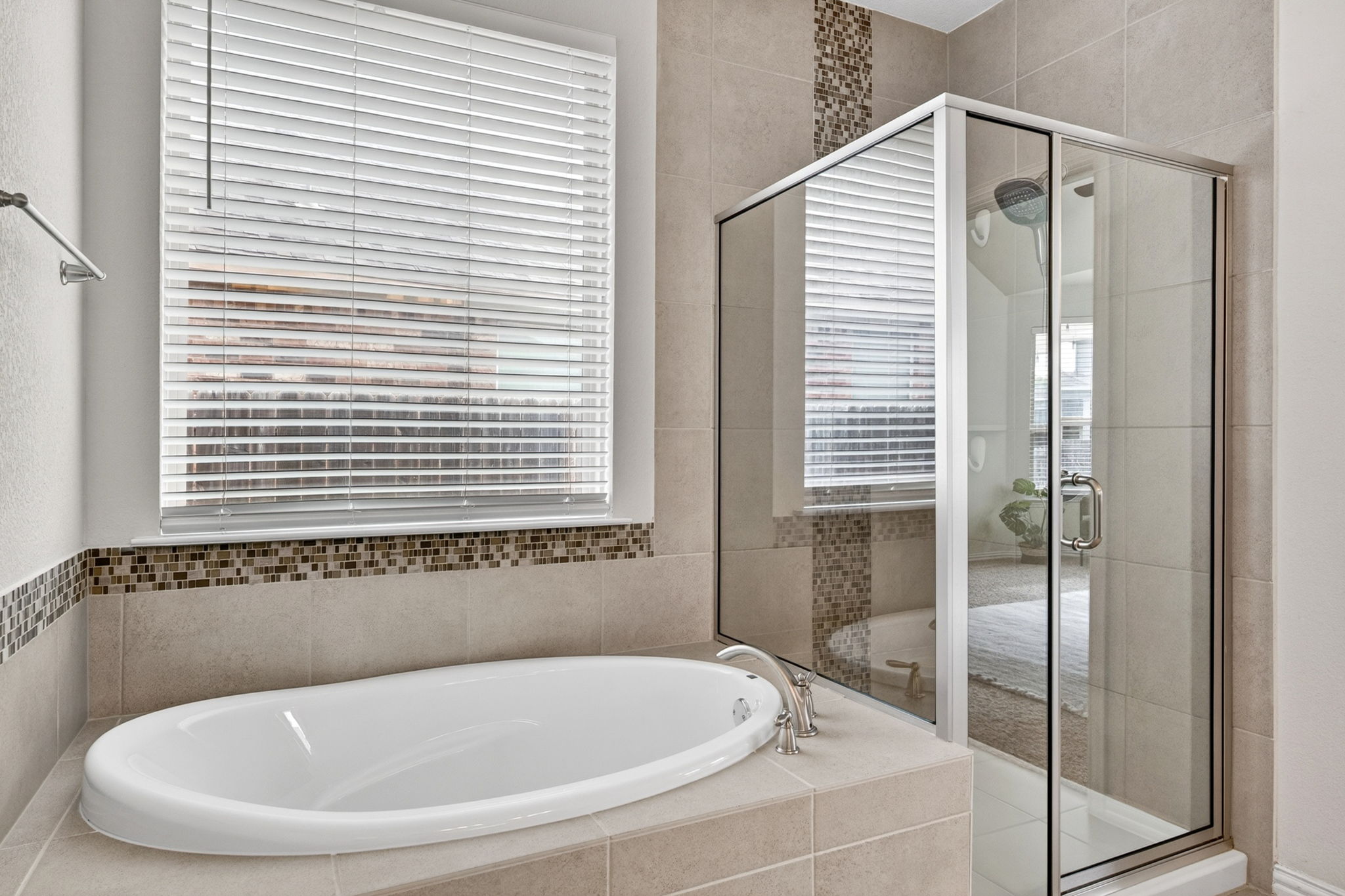 12613 Twisted Root Drive Manchaca, TX 78652 - Photo 14 of 32 a white bath tub sitting next to a window