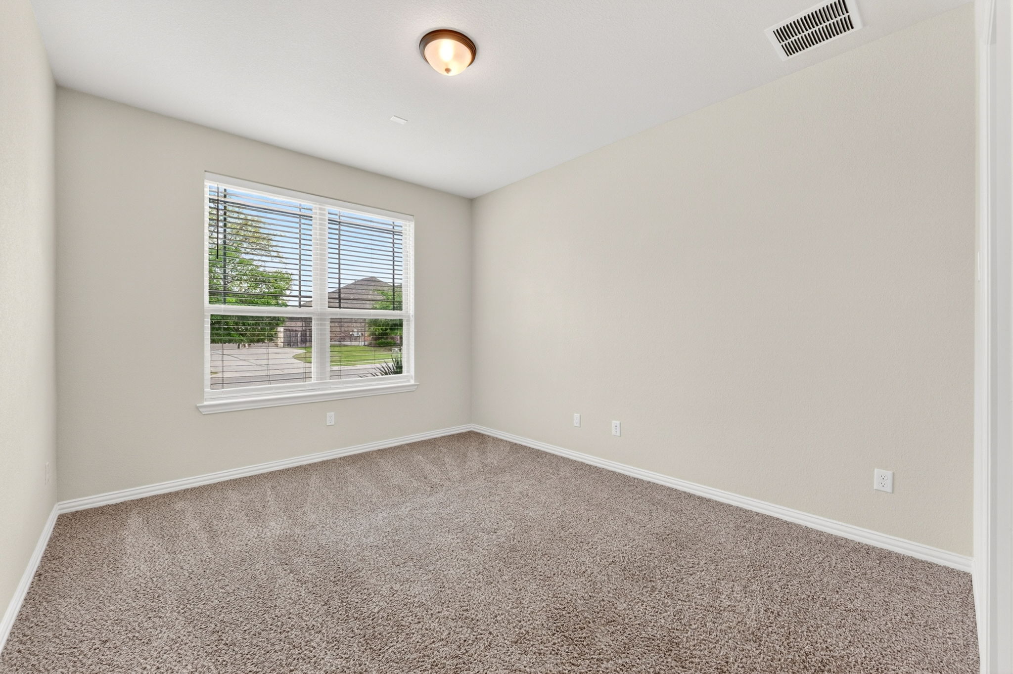 12613 Twisted Root Drive Manchaca, TX 78652 - Photo 15 of 32 an empty room with windows