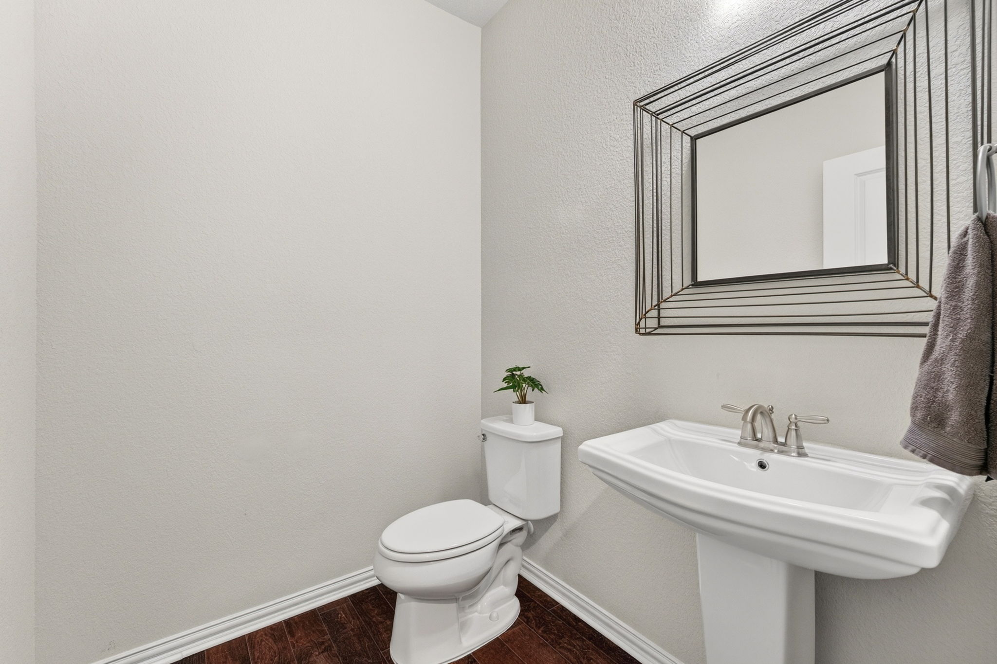 12613 Twisted Root Drive Manchaca, TX 78652 - Photo 17 of 32 a bathroom with a sink and a toilet