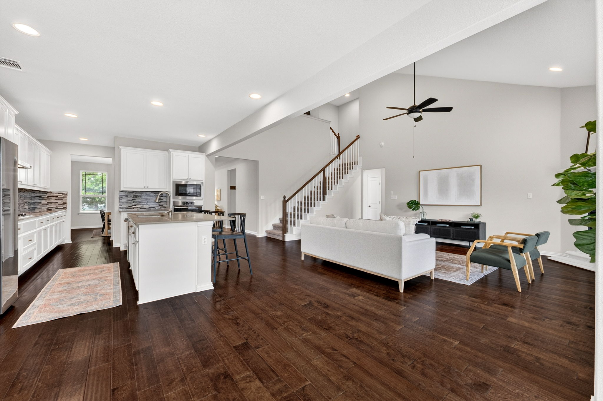 12613 Twisted Root Drive Manchaca, TX 78652 - Photo 10 of 32 a living room with furniture and kitchen view