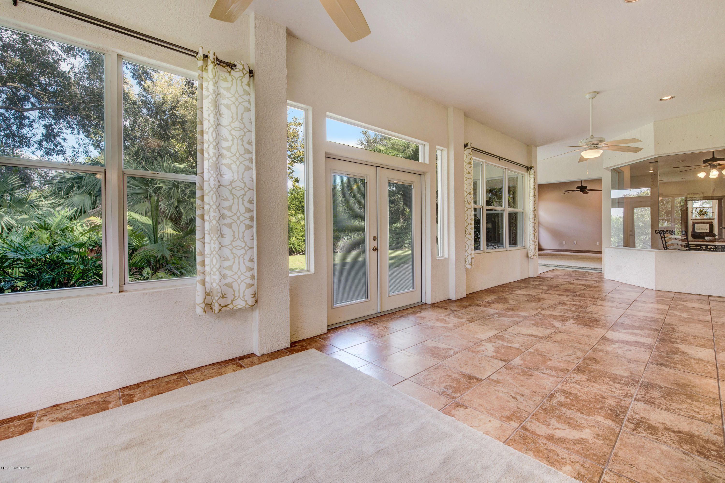 3570 Shady Run Road Melbourne, FL 32934 - Photo 17 of 39 a view of a room with a large window