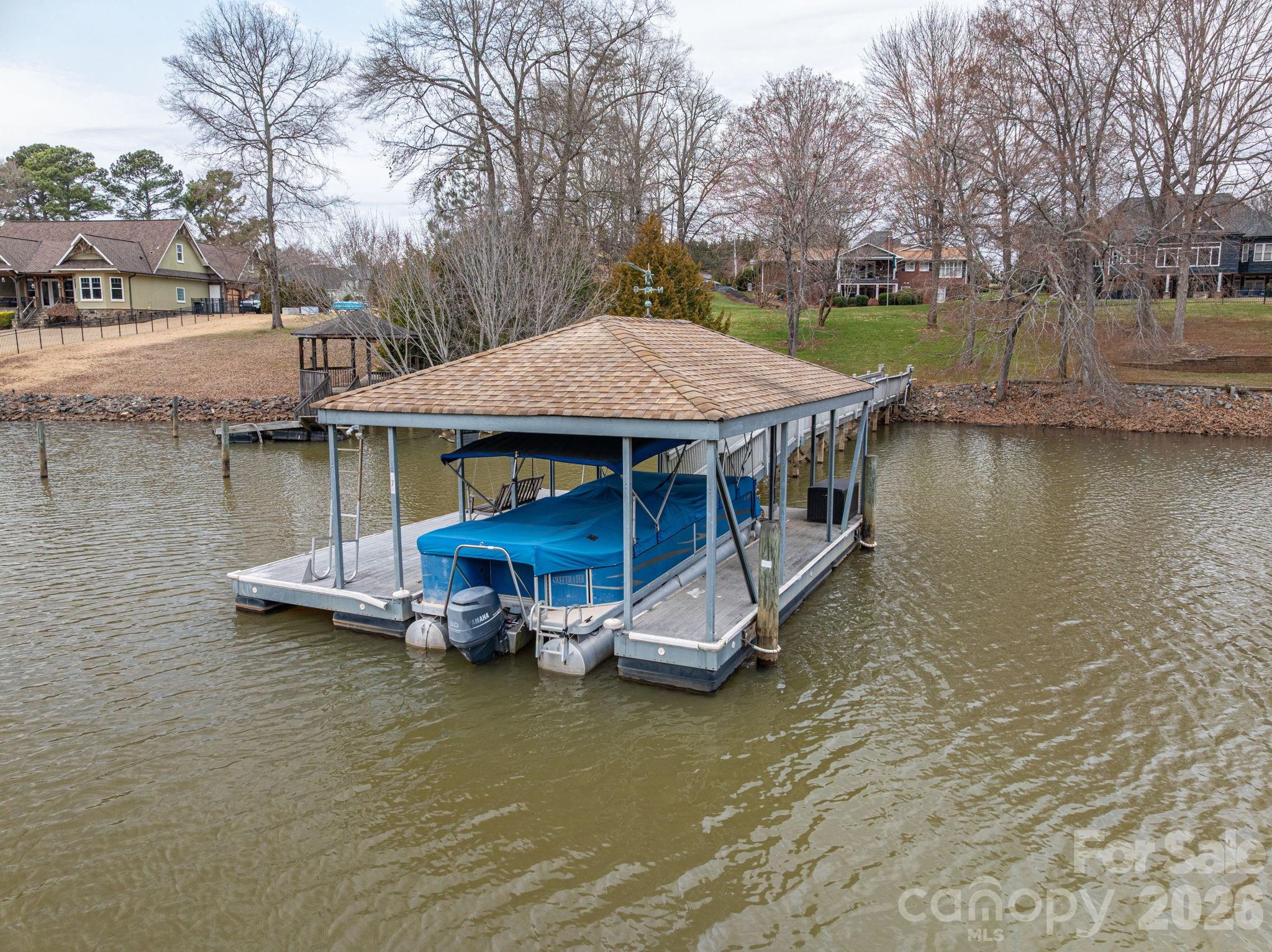 872 Armstrong Road Belmont, NC 28012 - Photo 15 of 48 a view of a house with pool and chairs