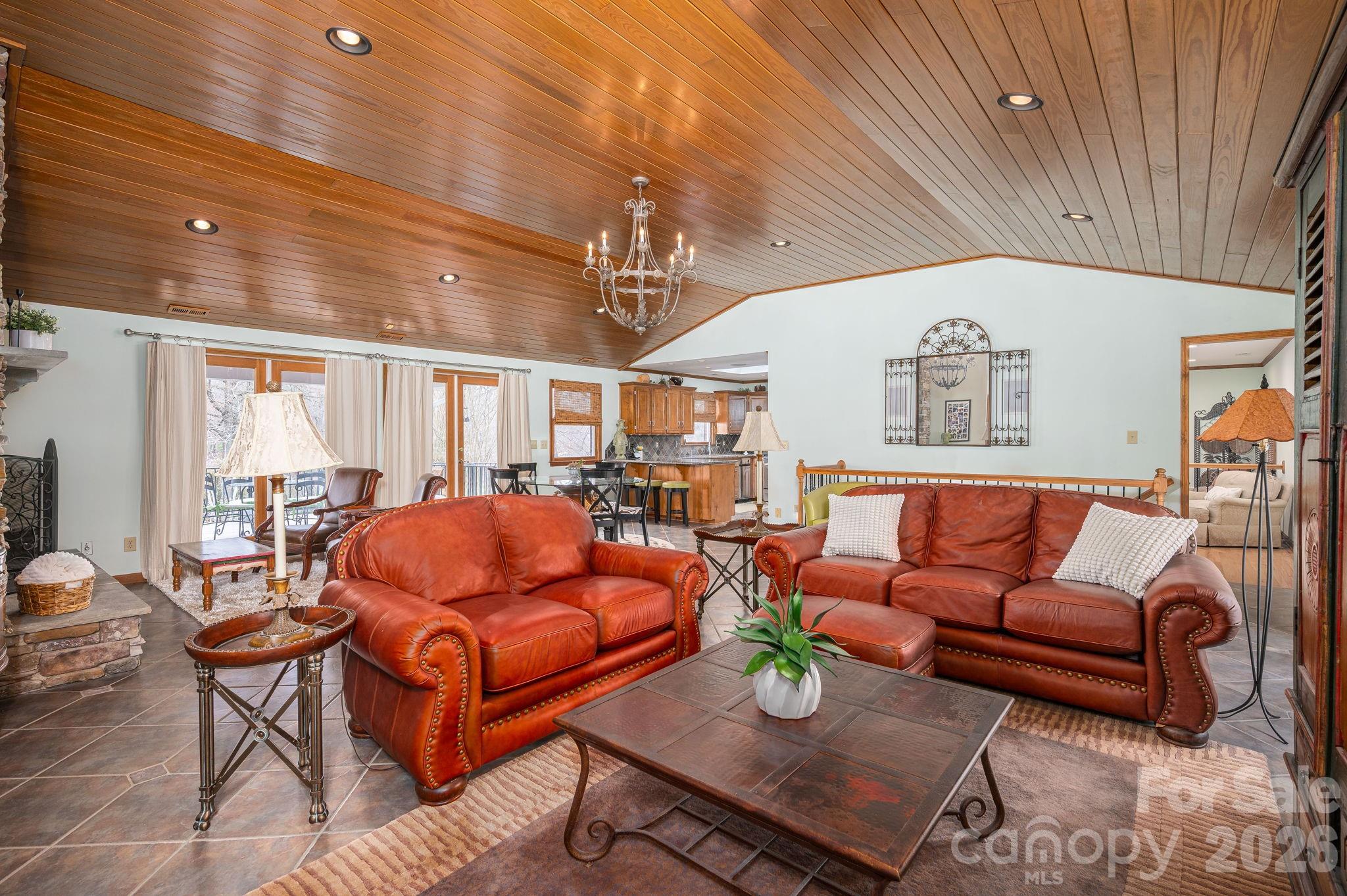 872 Armstrong Road Belmont, NC 28012 - Photo 20 of 48 a outdoor living space with furniture and a ceiling fan