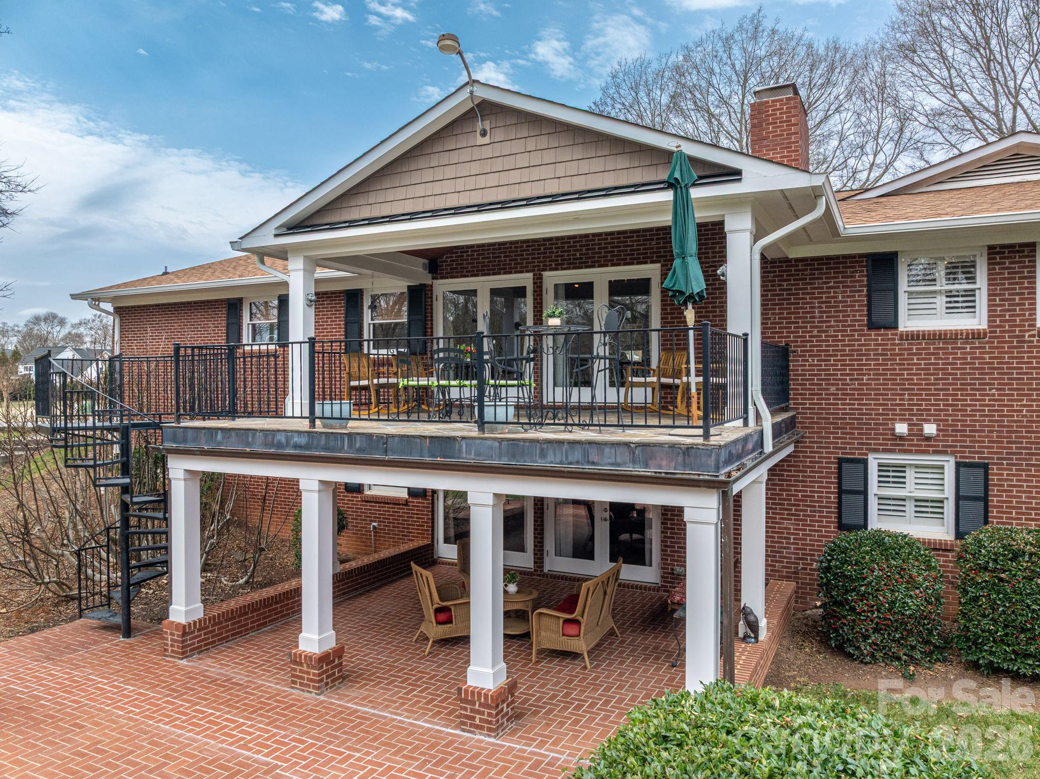 872 Armstrong Road Belmont, NC 28012 - Photo 2 of 48 a view of a house with a porch and furniture