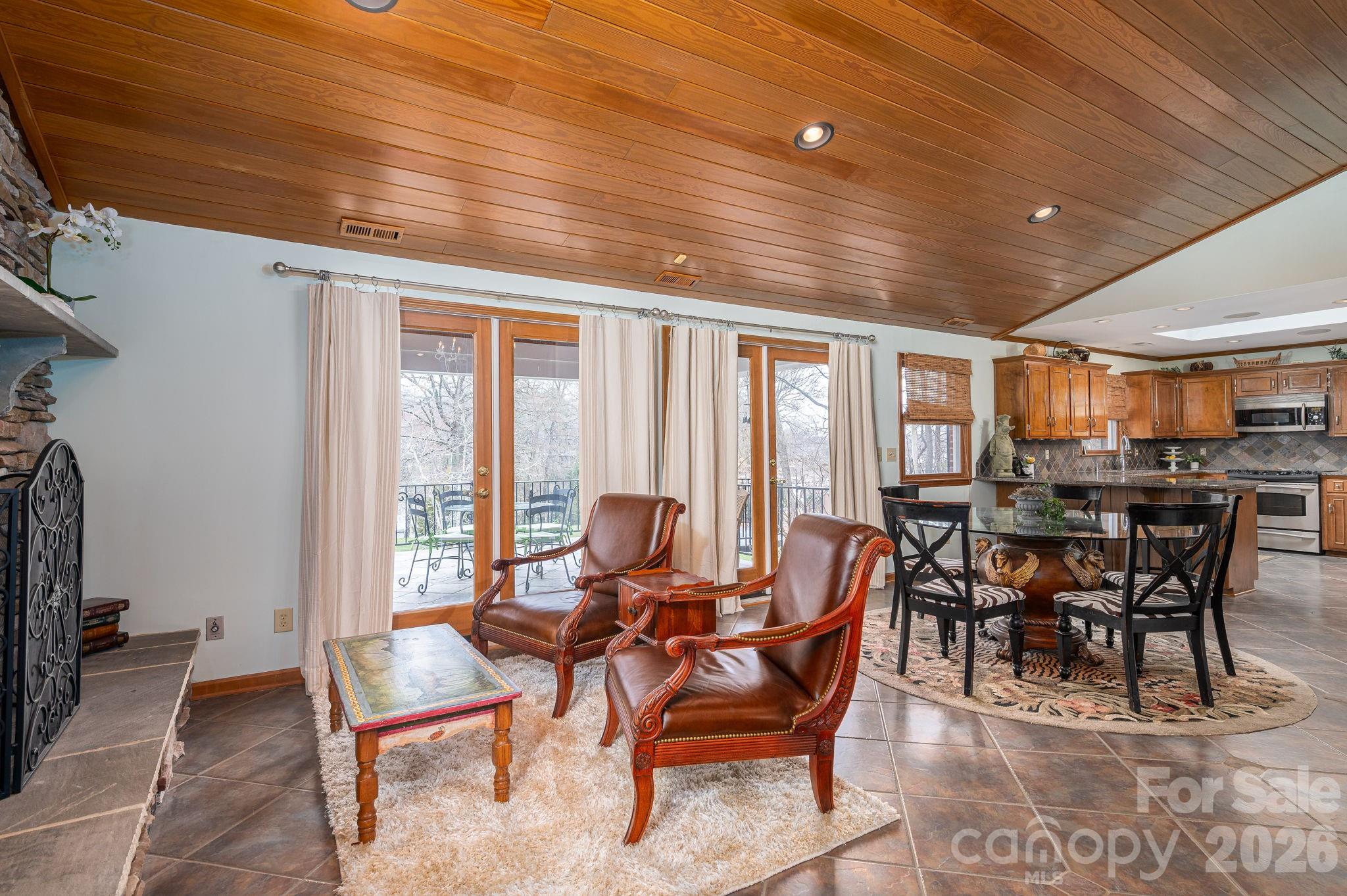 872 Armstrong Road Belmont, NC 28012 - Photo 22 of 48 a view of a dining room with furniture window and outside view