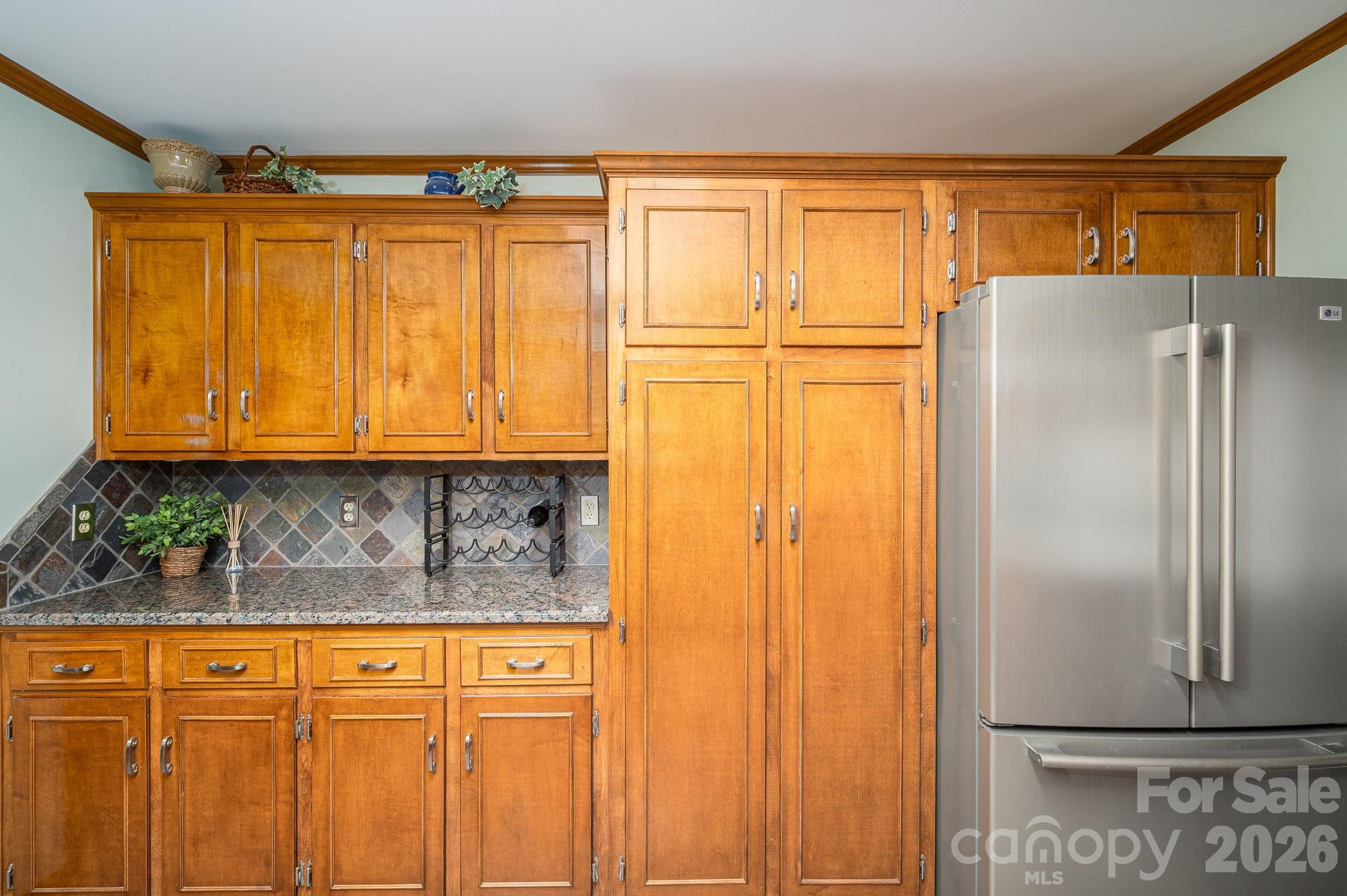 872 Armstrong Road Belmont, NC 28012 - Photo 27 of 48 a blue refrigerator with glass door