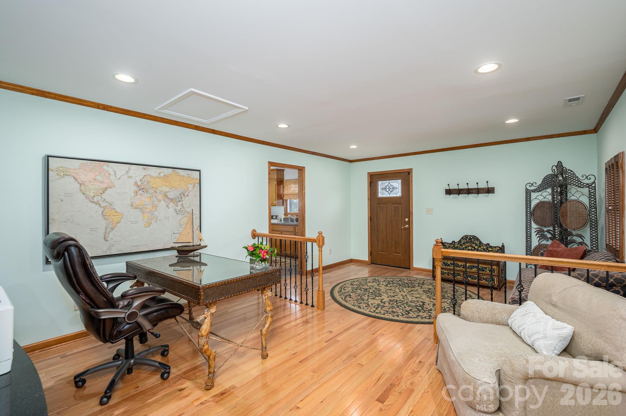 872 Armstrong Road Belmont, NC 28012 - Photo 31 of 48 a living room with furniture a rug and a table