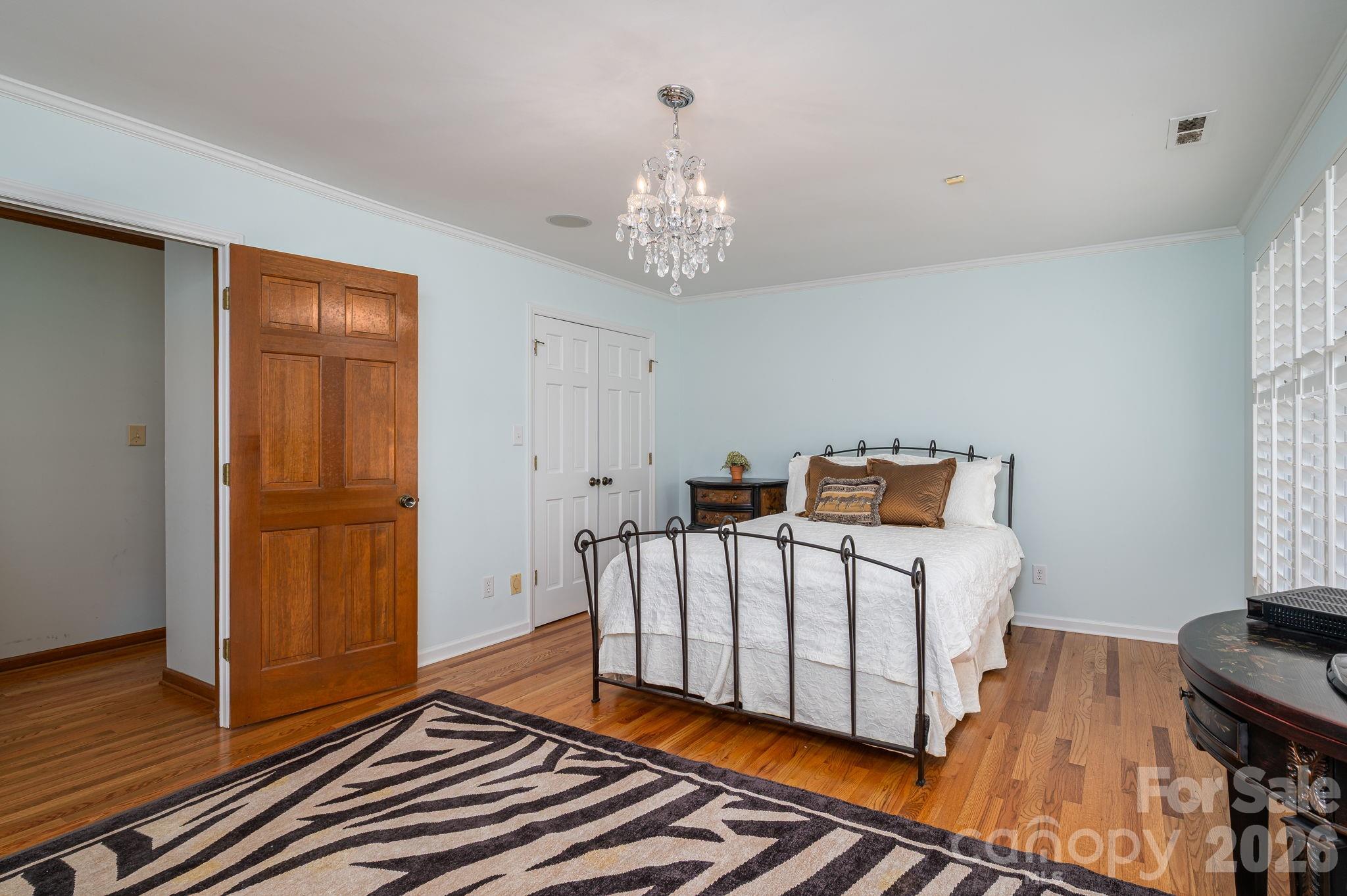 872 Armstrong Road Belmont, NC 28012 - Photo 36 of 48 a white bed sitting in a room next to a window