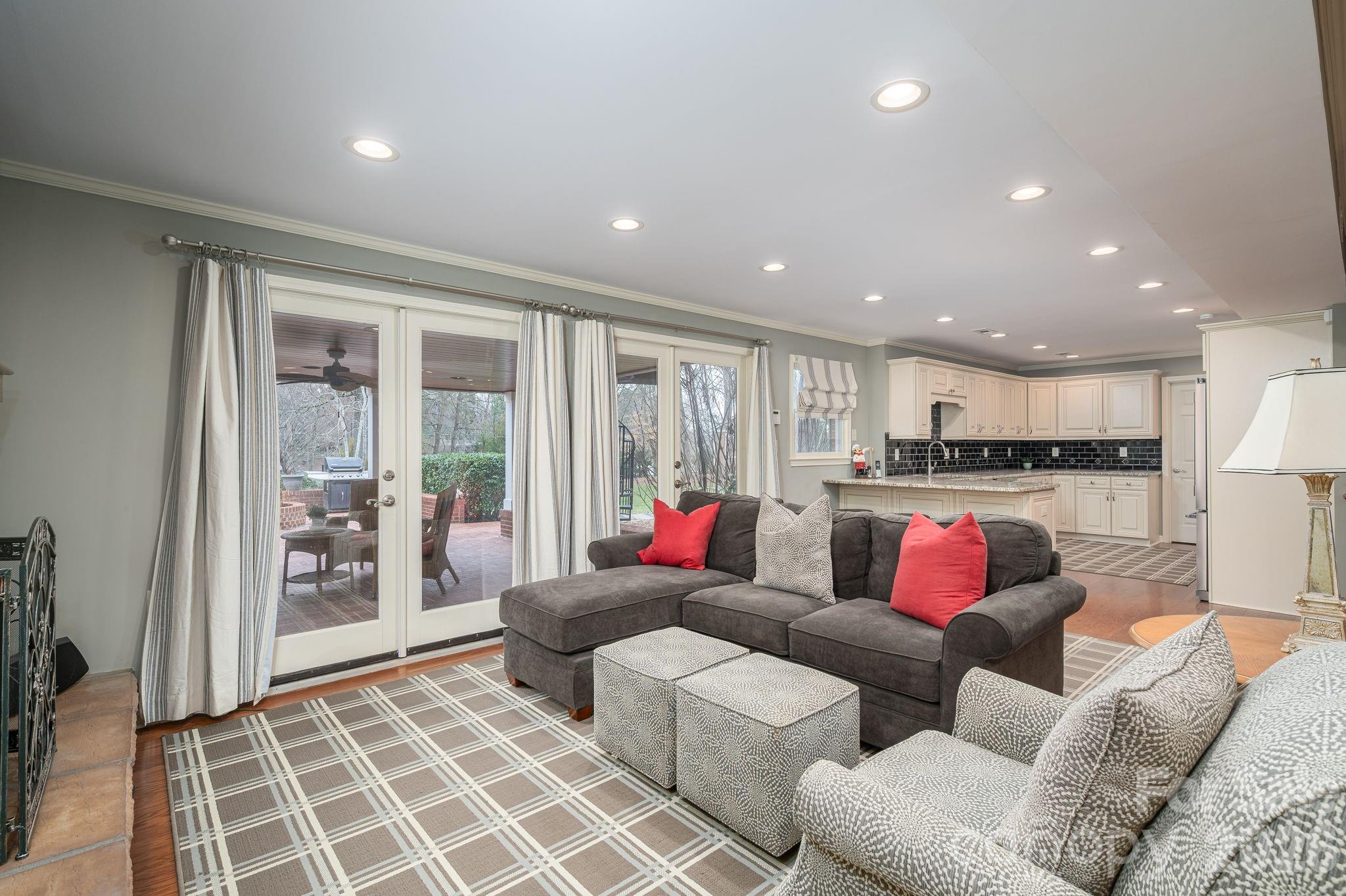872 Armstrong Road Belmont, NC 28012 - Photo 42 of 48 a living room with furniture and a floor to ceiling window