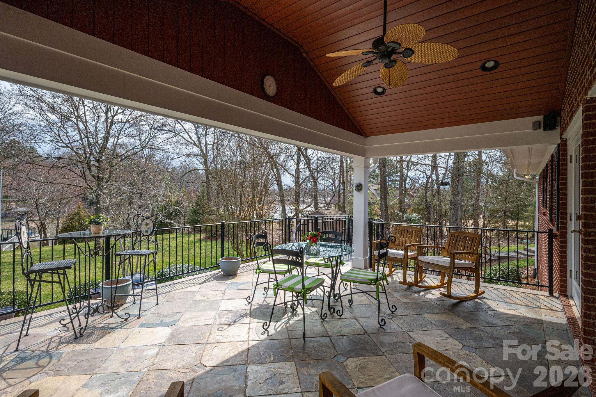 872 Armstrong Road Belmont, NC 28012 - Photo 5 of 48 a building outdoor space with patio lots of furniture and glass door