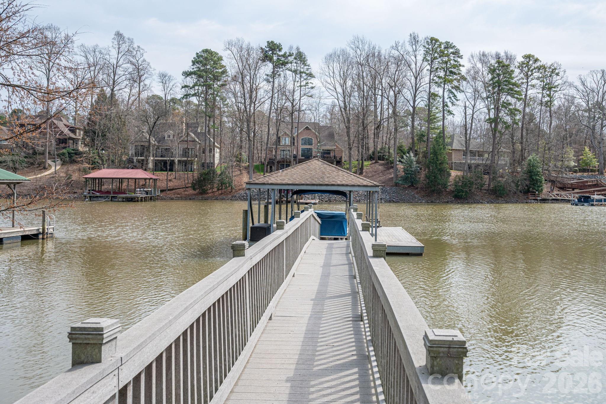 872 Armstrong Road Belmont, NC 28012 - Photo 10 of 48 a house view with a lake view