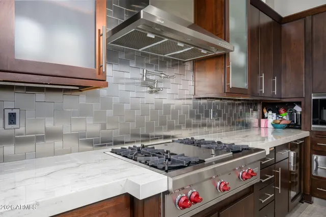a kitchen with a stove and a microwave