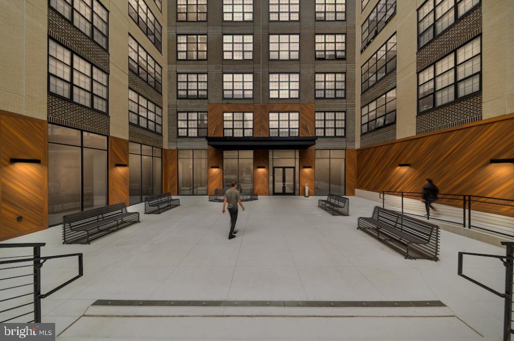 218-26 Arch Street, Unit 511 Philadelphia, PA 19106 - Photo 10 of 37 a view of a building with a street