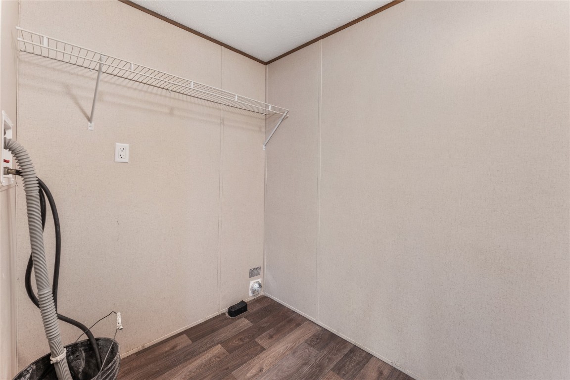 21504 Mexican John Road, Unit B New Caney, TX 77357 - Photo 4 of 13 a view of a room with wooden floor