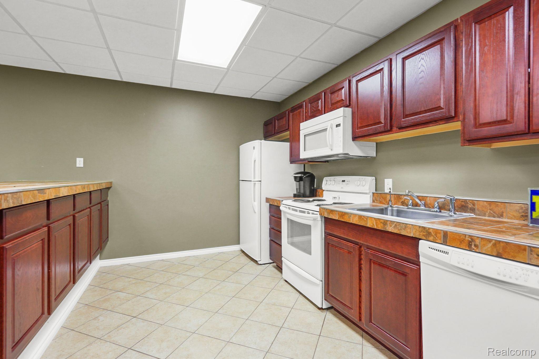 78007 Angling Road Richmond, MI 48062 - Photo 32 of 46 Additional kitchen in basement