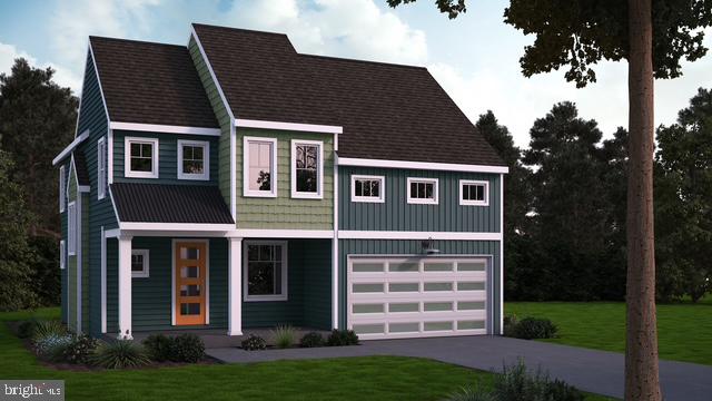 412 Cannon Way Lebanon, PA 17042 - Photo 1 of 1 a front view of a house with a garden