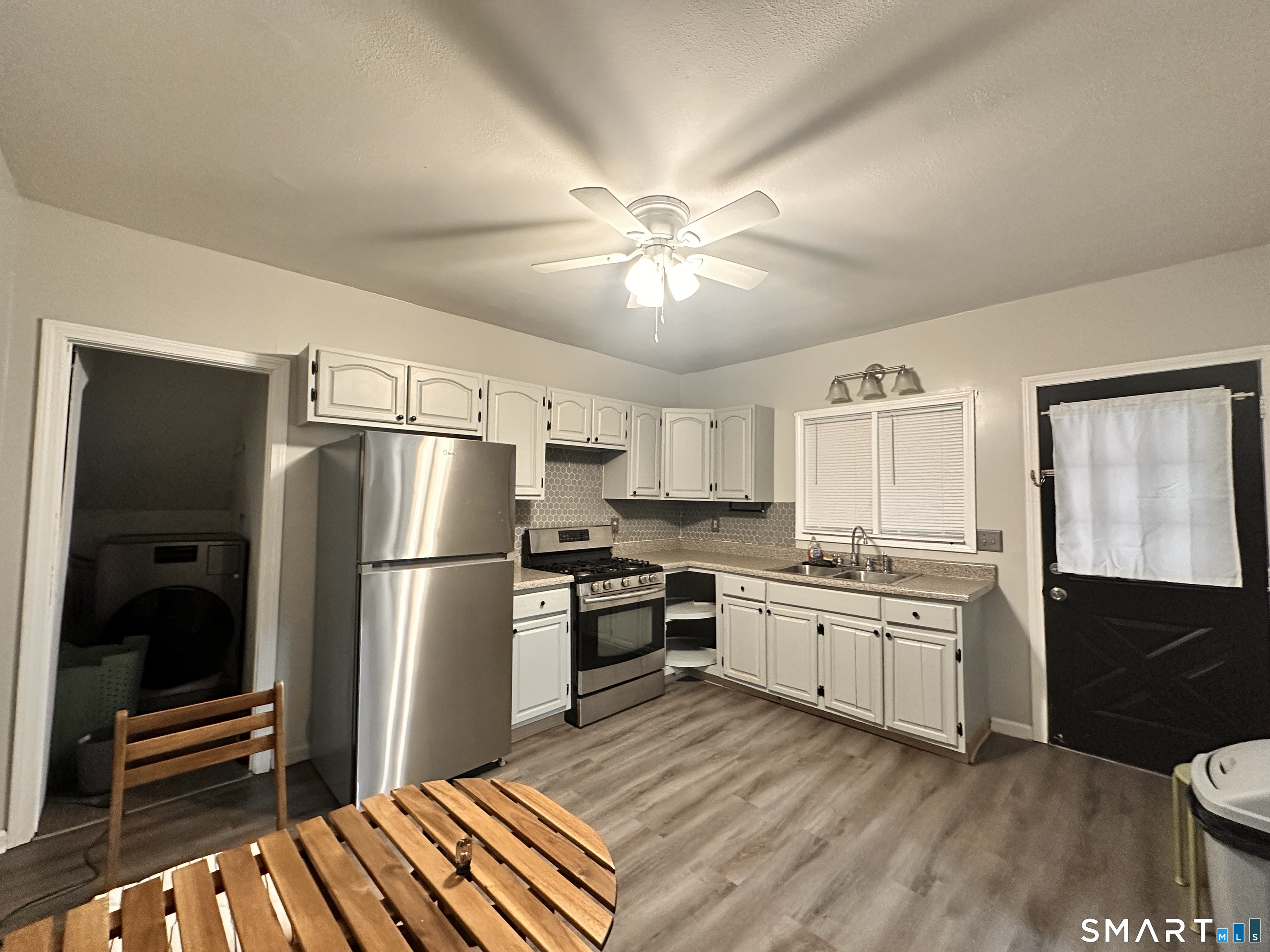 74 Mt Pleasant Street, Unit 2 Derby, CT 06418 - Photo 6 of 19 a kitchen with a refrigerator a stove and a sink