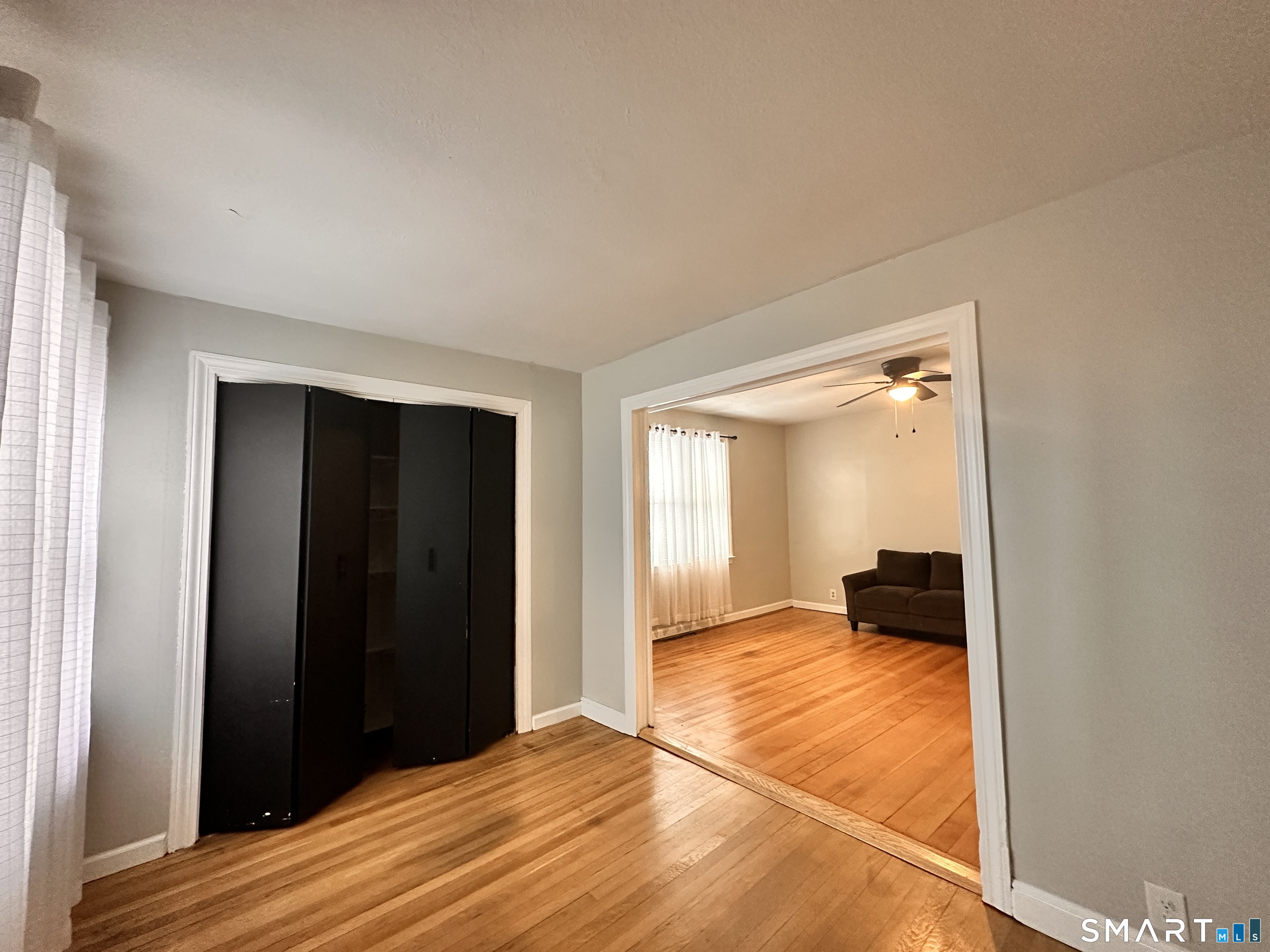 74 Mt Pleasant Street, Unit 2 Derby, CT 06418 - Photo 8 of 19 a view of an empty room and window
