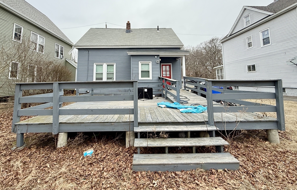 63 Langdon Street Springfield, MA 01104 - Photo 21 of 22 a front view of a house with a yard