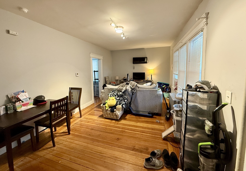 63 Langdon Street Springfield, MA 01104 - Photo 6 of 22 a bed room with furniture and a window