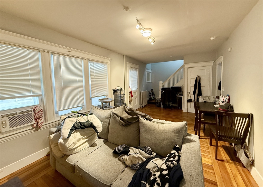 63 Langdon Street Springfield, MA 01104 - Photo 7 of 22 a living room with furniture and a table