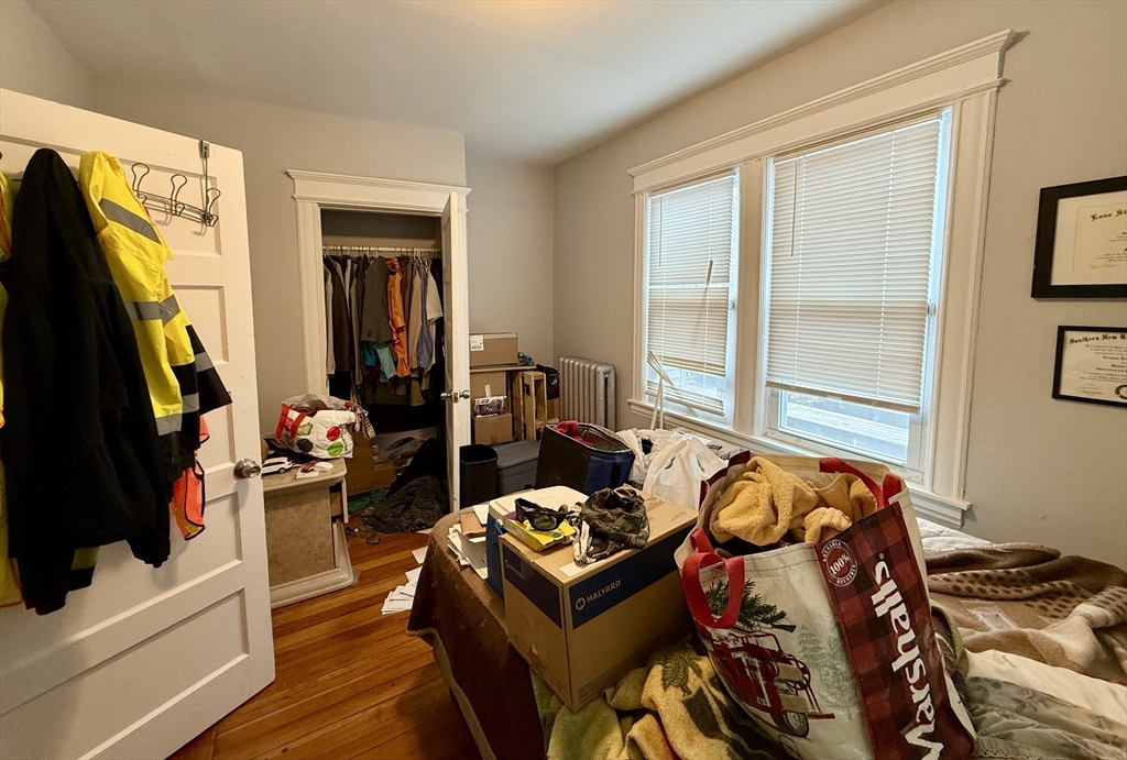 63 Langdon Street Springfield, MA 01104 - Photo 9 of 22 a living room with furniture and a flat screen tv