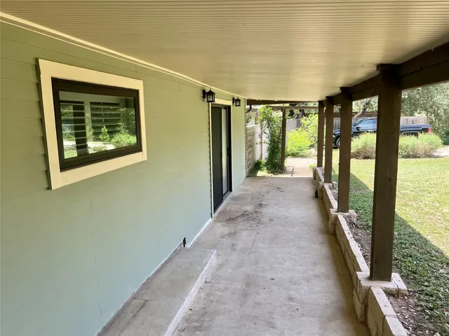 a view of outdoor space with wooden floor and outdoor space