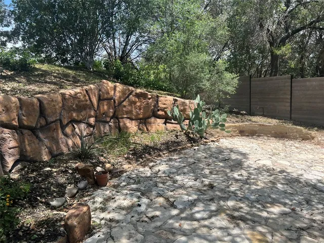 a backyard of a house with lots of green space