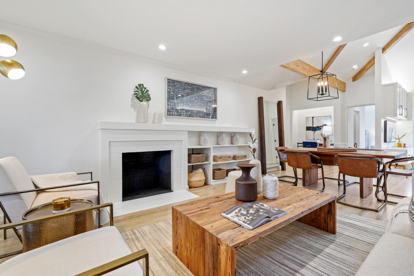 418 Dwight Road Burlingame, CA 94010 - Photo 13 of 45 a living room with furniture and a fireplace
