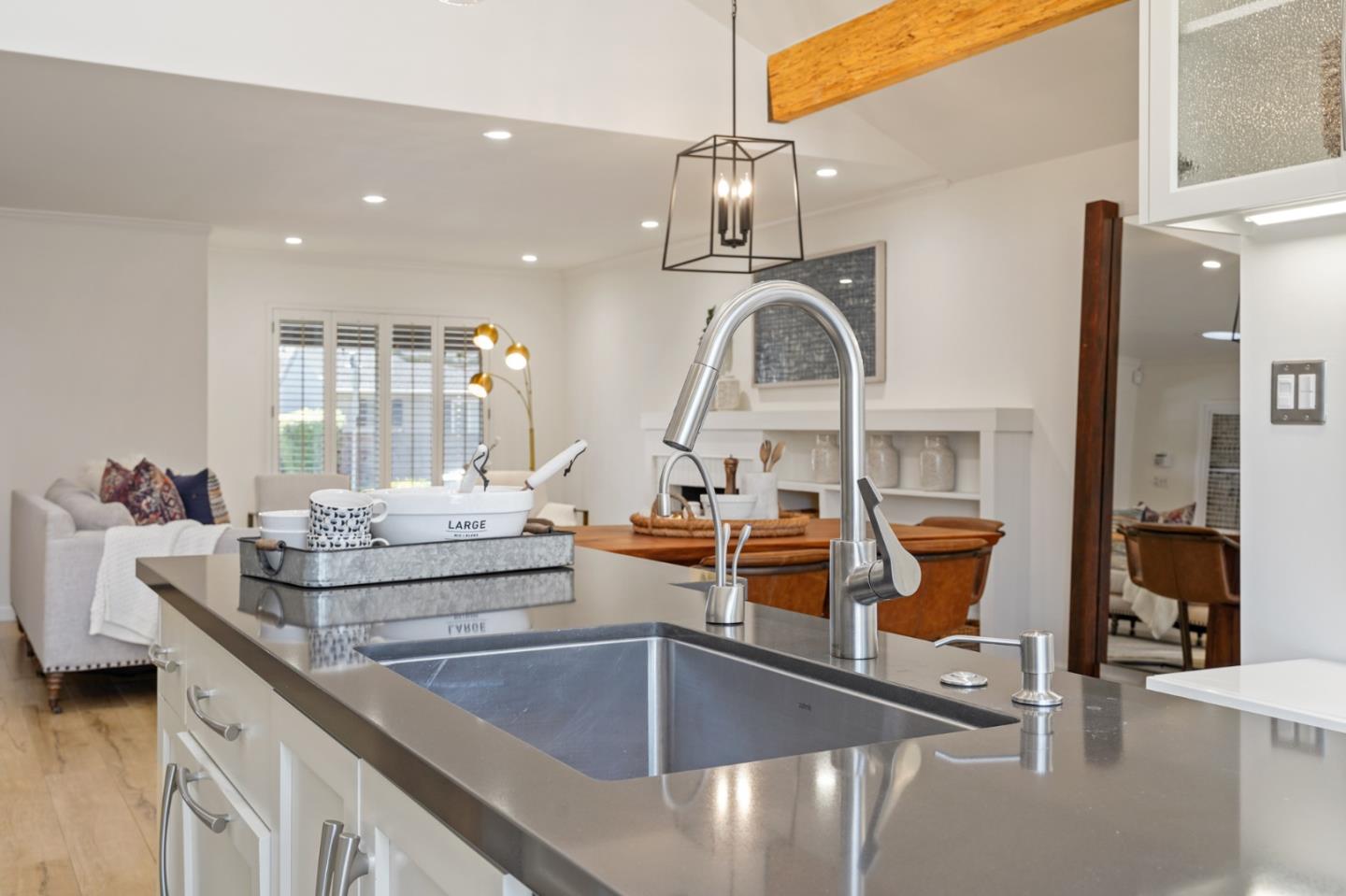 418 Dwight Road Burlingame, CA 94010 - Photo 19 of 45 a kitchen with stainless steel appliances kitchen island granite countertop a sink and cabinets
