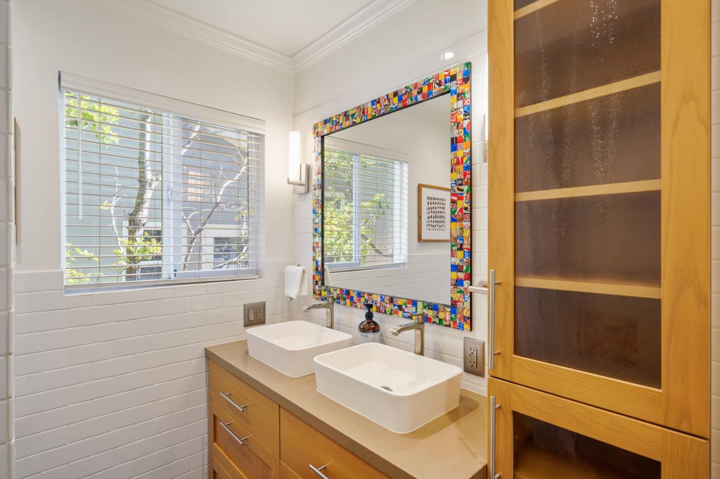 418 Dwight Road Burlingame, CA 94010 - Photo 24 of 45 a bathroom with a sink and a mirror