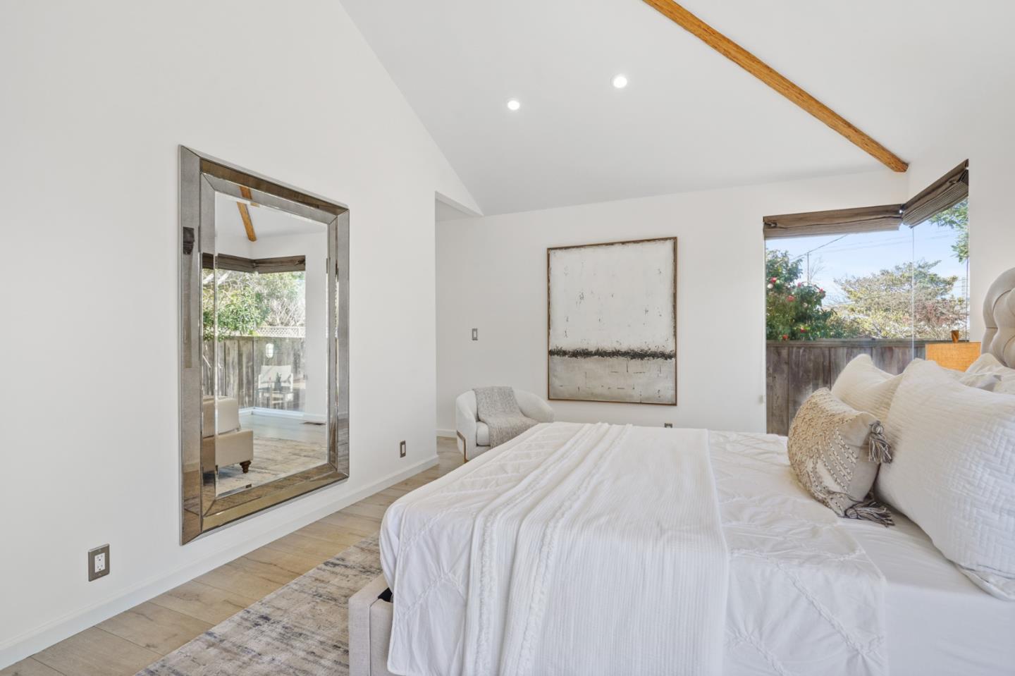 418 Dwight Road Burlingame, CA 94010 - Photo 31 of 45 a bedroom with a large bed and a window
