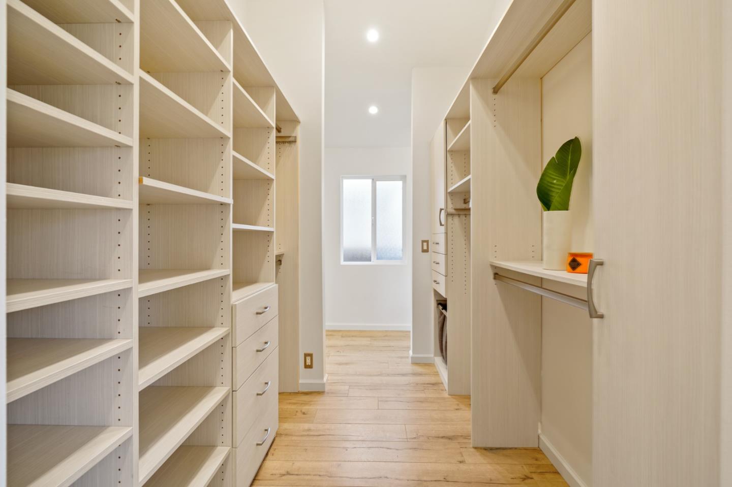 418 Dwight Road Burlingame, CA 94010 - Photo 34 of 45 a view of a hallway with wooden floor and entryway